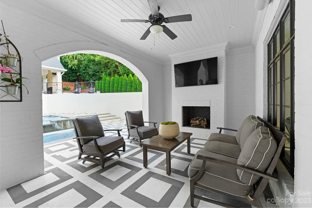This stately transitional Myers Park home is situated on a large lot and features a spacious floor plan, a gourmet kitchen, a large pool with hot tub and water features, a newly built pool house with full bathroom, laundry, and outdoor patio with fireplace, and a newly built sport court that can act as a basketball court, pickleball court, volley ball, and tennis court. It is conveniently located to everything!