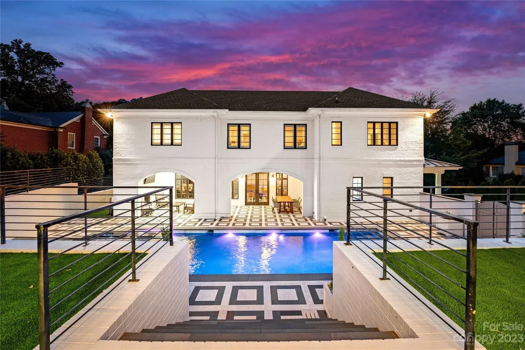 This stately transitional Myers Park home is situated on a large lot and features a spacious floor plan, a gourmet kitchen, a large pool with hot tub and water features, a newly built pool house with full bathroom, laundry, and outdoor patio with fireplace, and a newly built sport court that can act as a basketball court, pickleball court, volley ball, and tennis court. It is conveniently located to everything!