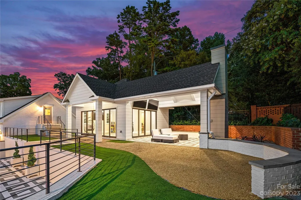 This stately transitional Myers Park home is situated on a large lot and features a spacious floor plan, a gourmet kitchen, a large pool with hot tub and water features, a newly built pool house with full bathroom, laundry, and outdoor patio with fireplace, and a newly built sport court that can act as a basketball court, pickleball court, volley ball, and tennis court. It is conveniently located to everything!