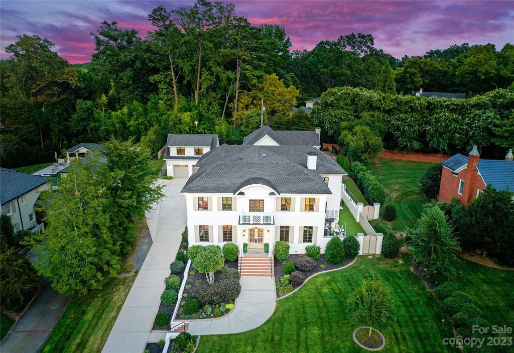 This stately transitional Myers Park home is situated on a large lot and features a spacious floor plan, a gourmet kitchen, a large pool with hot tub and water features, a newly built pool house with full bathroom, laundry, and outdoor patio with fireplace, and a newly built sport court that can act as a basketball court, pickleball court, volley ball, and tennis court. It is conveniently located to everything!