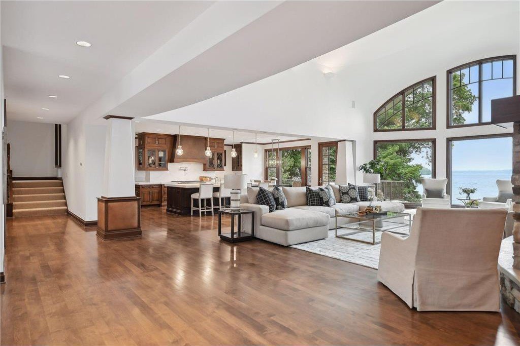 20630 Linwood Road Home in Excelsior, Minnesota. Welcome to 20630 Linwood Road, an exquisite gated estate nestled on two acres in the heart of Cottagewood USA, boasting 134 feet of premium northwest-facing, sandy, level lakeshore on Lake Minnetonka.