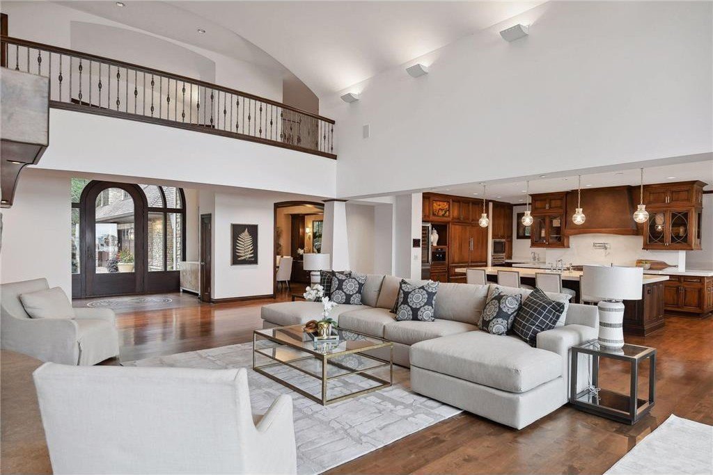 20630 Linwood Road Home in Excelsior, Minnesota. Welcome to 20630 Linwood Road, an exquisite gated estate nestled on two acres in the heart of Cottagewood USA, boasting 134 feet of premium northwest-facing, sandy, level lakeshore on Lake Minnetonka.