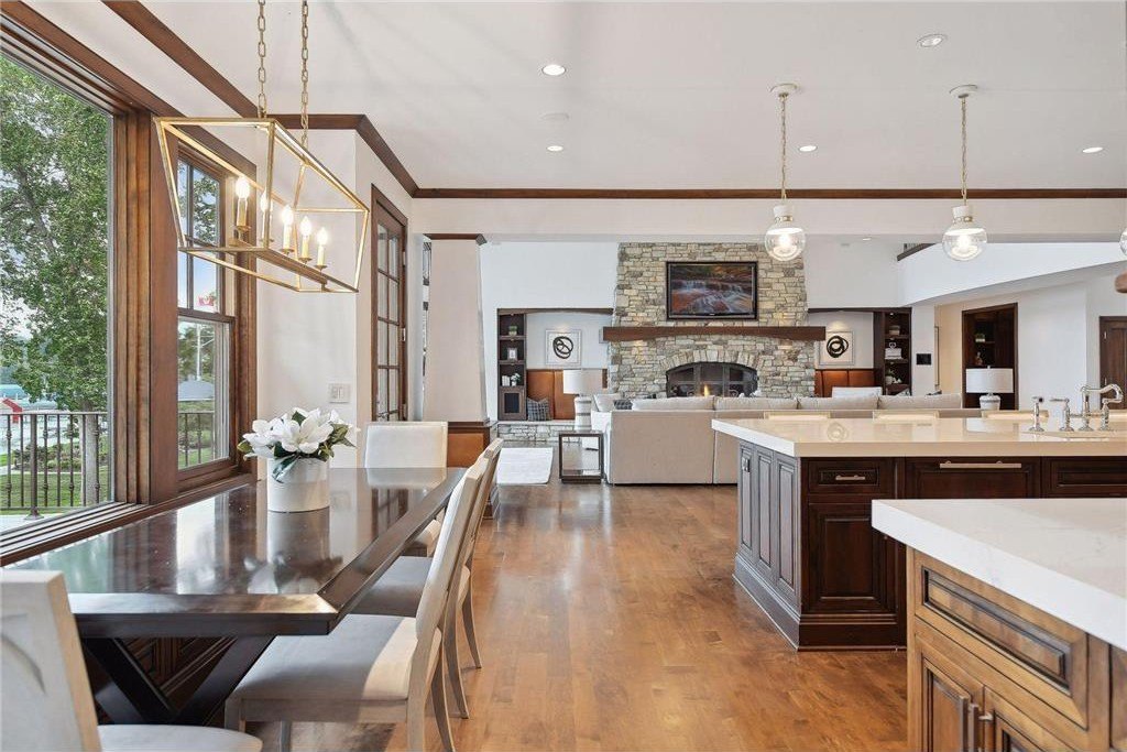 20630 Linwood Road Home in Excelsior, Minnesota. Welcome to 20630 Linwood Road, an exquisite gated estate nestled on two acres in the heart of Cottagewood USA, boasting 134 feet of premium northwest-facing, sandy, level lakeshore on Lake Minnetonka.
