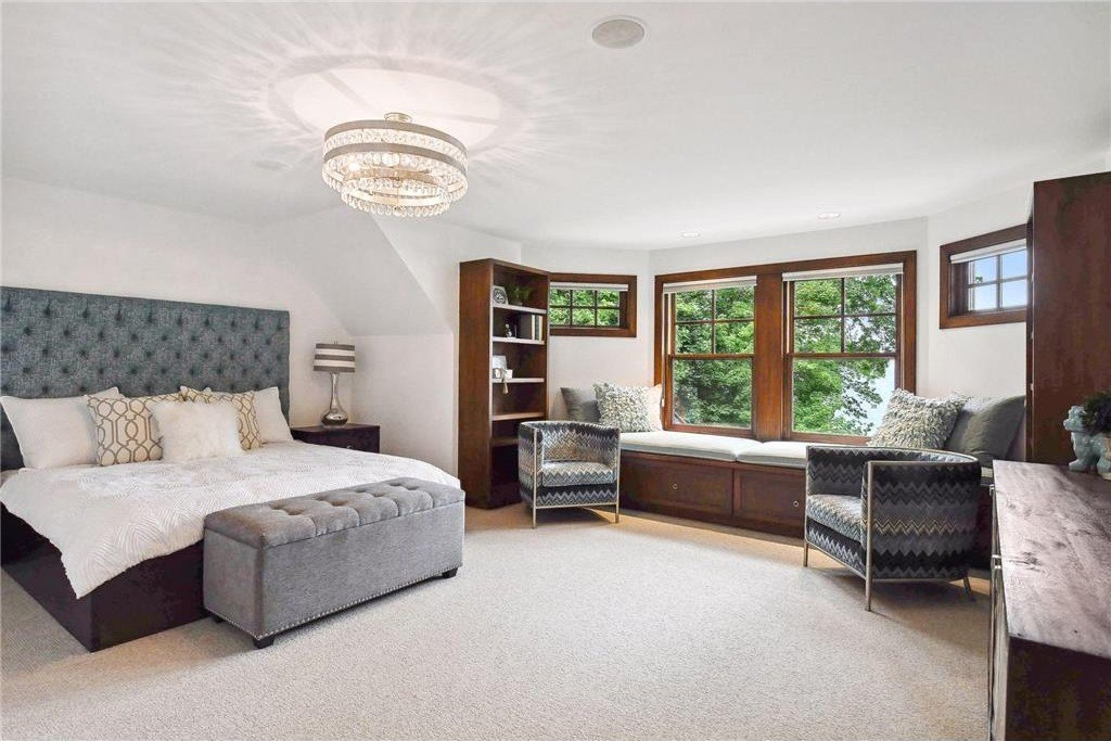 20630 Linwood Road Home in Excelsior, Minnesota. Welcome to 20630 Linwood Road, an exquisite gated estate nestled on two acres in the heart of Cottagewood USA, boasting 134 feet of premium northwest-facing, sandy, level lakeshore on Lake Minnetonka.