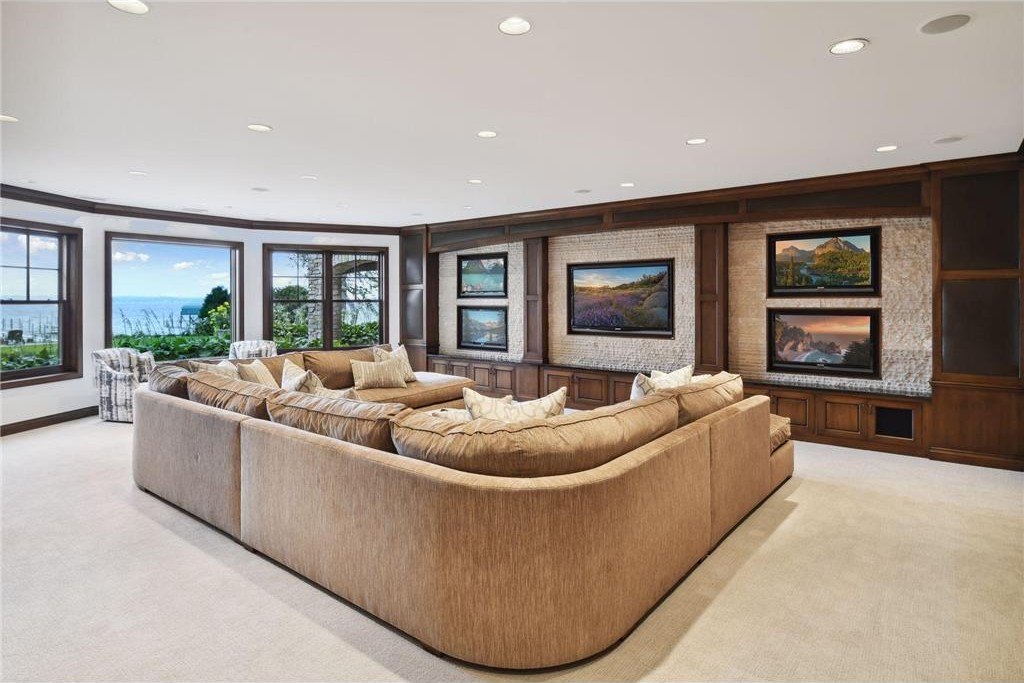 20630 Linwood Road Home in Excelsior, Minnesota. Welcome to 20630 Linwood Road, an exquisite gated estate nestled on two acres in the heart of Cottagewood USA, boasting 134 feet of premium northwest-facing, sandy, level lakeshore on Lake Minnetonka.