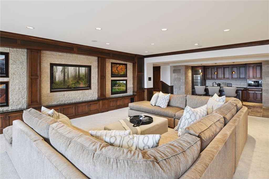 20630 Linwood Road Home in Excelsior, Minnesota. Welcome to 20630 Linwood Road, an exquisite gated estate nestled on two acres in the heart of Cottagewood USA, boasting 134 feet of premium northwest-facing, sandy, level lakeshore on Lake Minnetonka.
