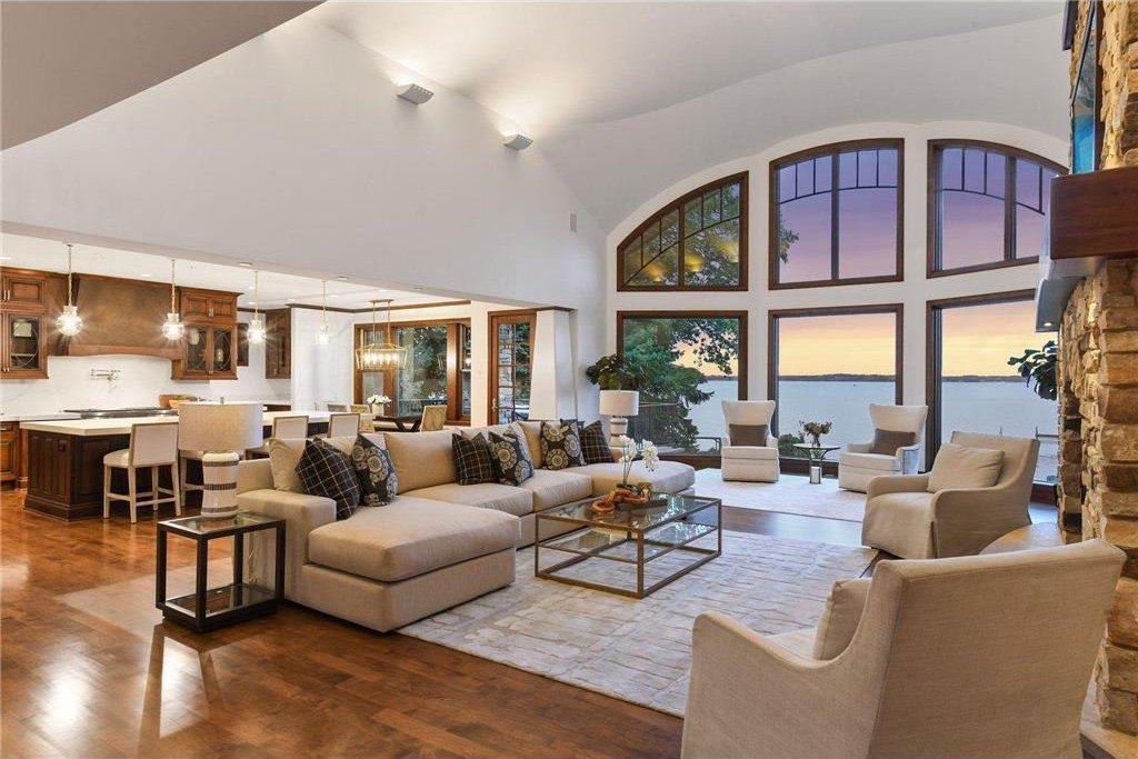 20630 Linwood Road Home in Excelsior, Minnesota. Welcome to 20630 Linwood Road, an exquisite gated estate nestled on two acres in the heart of Cottagewood USA, boasting 134 feet of premium northwest-facing, sandy, level lakeshore on Lake Minnetonka.