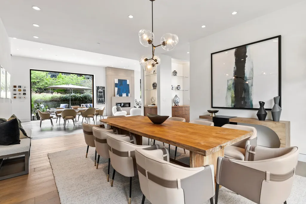 2140 Forest View Avenue Home in Hillsborough, California. Step into the future with this 2016-built contemporary masterpiece located on a premier street in lower North Hillsborough. Designed by architect Dan Phipps and constructed by Toboni Builders, this home is a model of sustainable living with features like solar power, radiant-heated concrete or oak floors, EV wiring, and a radiant deck-heated saltwater pool, all situated on just over half an acre.
