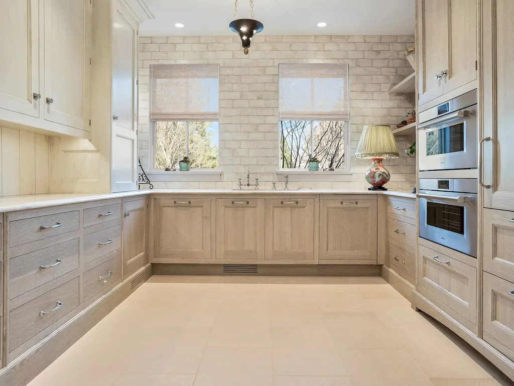 222 West Van Buren Avenue Home in Naperville, Illinois. Experience the epitome of luxury living at the Laurel Estate, a stunning French provincial-style mansion meticulously crafted by Charles Cook Architectural Design Studio. This flagship Midwest estate offers a unique blend of elegant design, spa-like ambiance, and seamless indoor-outdoor spaces. 