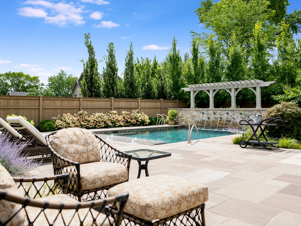 222 West Van Buren Avenue Home in Naperville, Illinois. Experience the epitome of luxury living at the Laurel Estate, a stunning French provincial-style mansion meticulously crafted by Charles Cook Architectural Design Studio. This flagship Midwest estate offers a unique blend of elegant design, spa-like ambiance, and seamless indoor-outdoor spaces. 