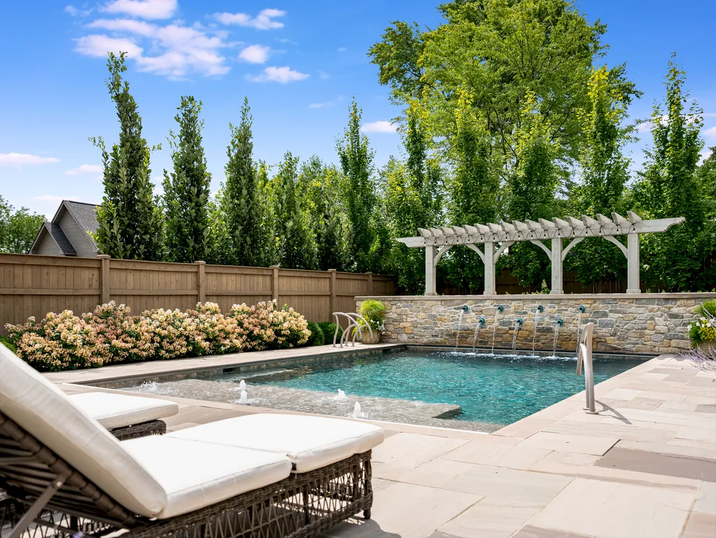 222 West Van Buren Avenue Home in Naperville, Illinois. Experience the epitome of luxury living at the Laurel Estate, a stunning French provincial-style mansion meticulously crafted by Charles Cook Architectural Design Studio. This flagship Midwest estate offers a unique blend of elegant design, spa-like ambiance, and seamless indoor-outdoor spaces. 
