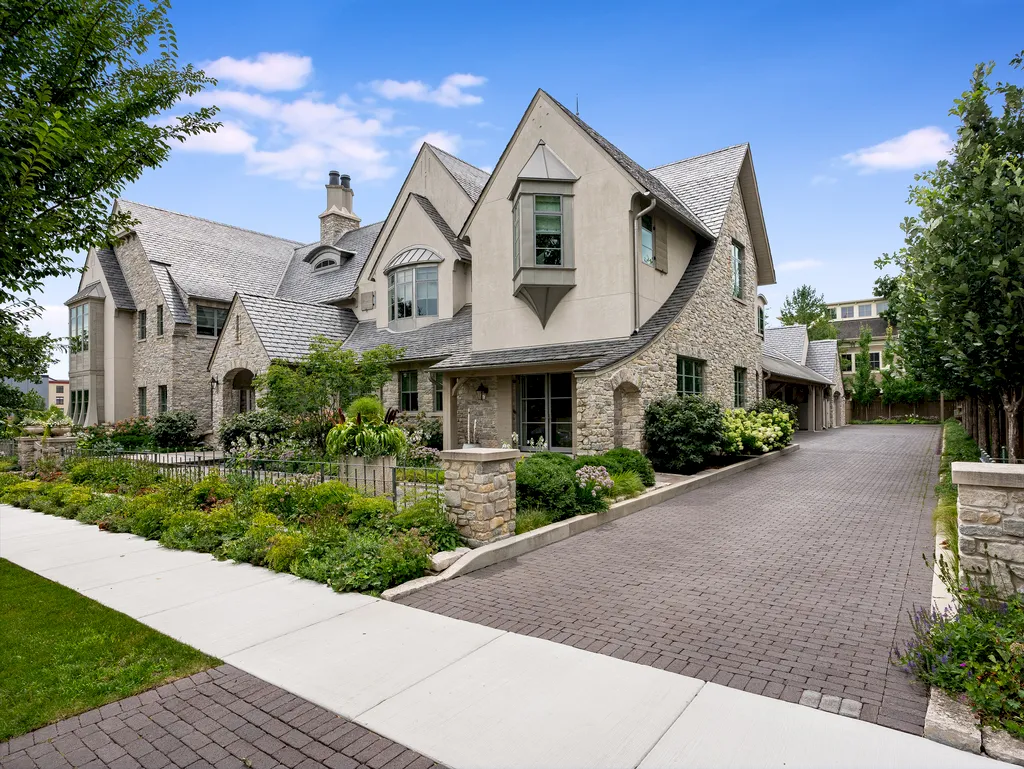 222 West Van Buren Avenue Home in Naperville, Illinois. Experience the epitome of luxury living at the Laurel Estate, a stunning French provincial-style mansion meticulously crafted by Charles Cook Architectural Design Studio. This flagship Midwest estate offers a unique blend of elegant design, spa-like ambiance, and seamless indoor-outdoor spaces. 