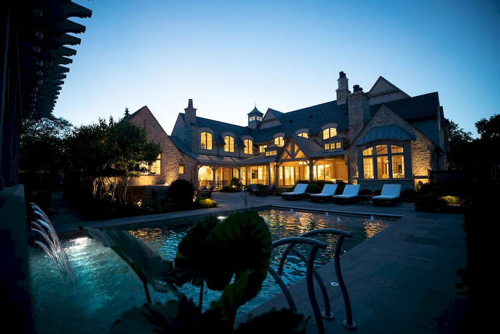 222 West Van Buren Avenue Home in Naperville, Illinois. Experience the epitome of luxury living at the Laurel Estate, a stunning French provincial-style mansion meticulously crafted by Charles Cook Architectural Design Studio. This flagship Midwest estate offers a unique blend of elegant design, spa-like ambiance, and seamless indoor-outdoor spaces. 