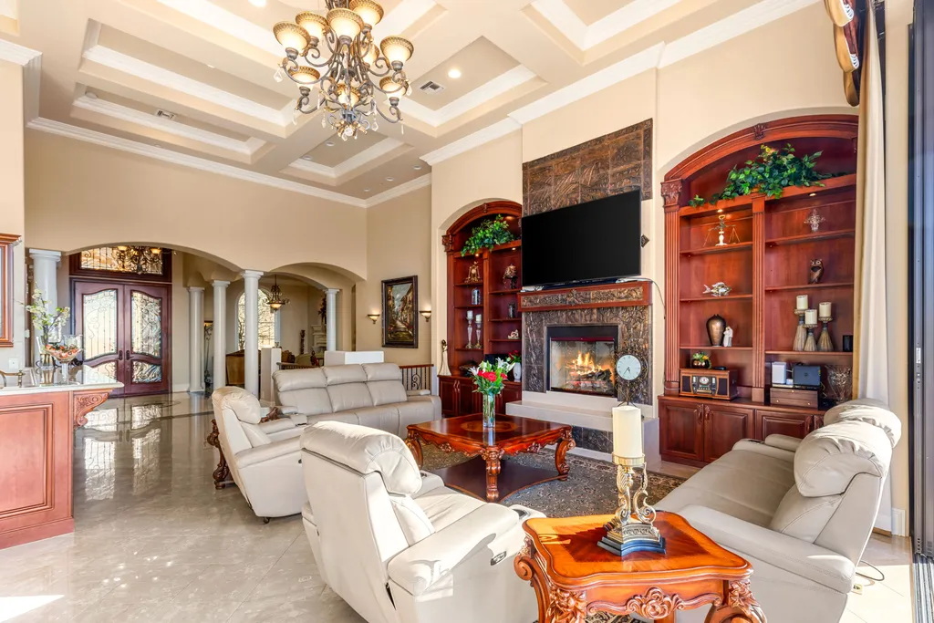 232 Valare Street Home in Henderson, Nevada. Discover the epitome of luxury living in this custom-built split-level home in Las Vegas. With stunning city views, lavish amenities, and meticulous attention to detail, this residence offers the ultimate in upscale living. From the private gated entrance to the infinity pool and spa overlooking the city, this Las Vegas dream home redefines luxury living.