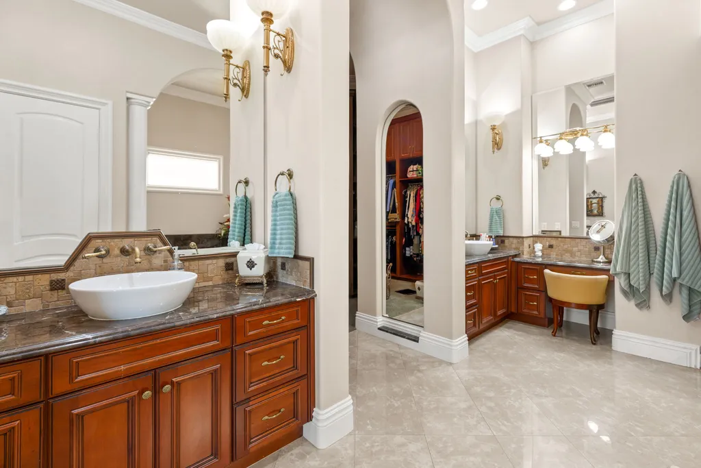 232 Valare Street Home in Henderson, Nevada. Discover the epitome of luxury living in this custom-built split-level home in Las Vegas. With stunning city views, lavish amenities, and meticulous attention to detail, this residence offers the ultimate in upscale living. From the private gated entrance to the infinity pool and spa overlooking the city, this Las Vegas dream home redefines luxury living.