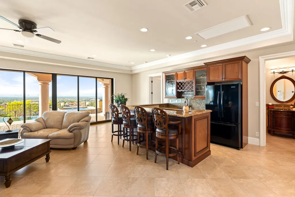 232 Valare Street Home in Henderson, Nevada. Discover the epitome of luxury living in this custom-built split-level home in Las Vegas. With stunning city views, lavish amenities, and meticulous attention to detail, this residence offers the ultimate in upscale living. From the private gated entrance to the infinity pool and spa overlooking the city, this Las Vegas dream home redefines luxury living.