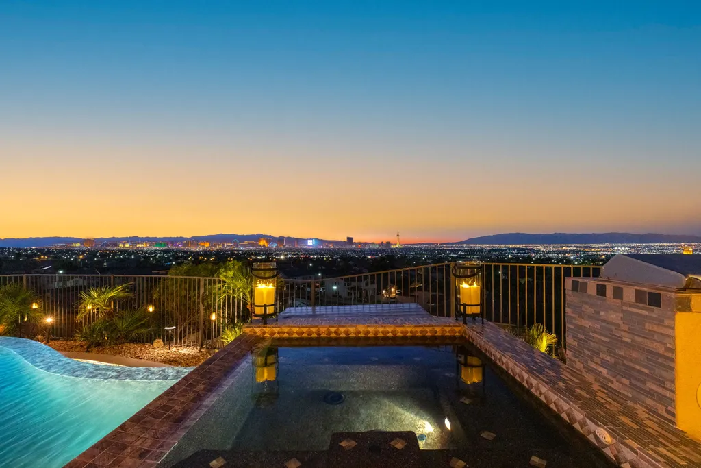 232 Valare Street Home in Henderson, Nevada. Discover the epitome of luxury living in this custom-built split-level home in Las Vegas. With stunning city views, lavish amenities, and meticulous attention to detail, this residence offers the ultimate in upscale living. From the private gated entrance to the infinity pool and spa overlooking the city, this Las Vegas dream home redefines luxury living.