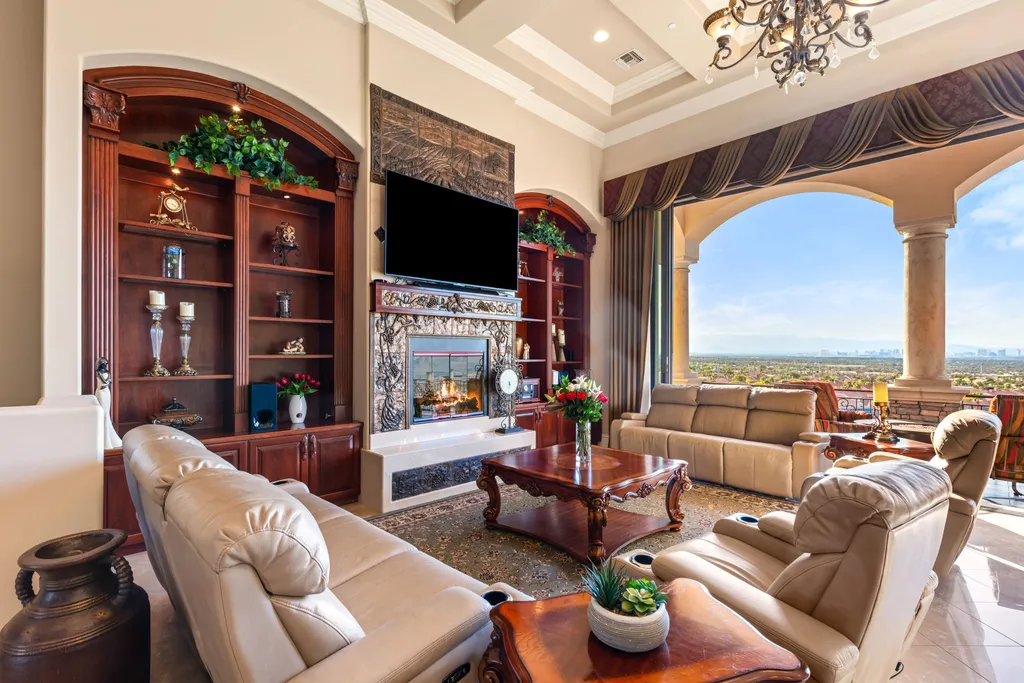 232 Valare Street Home in Henderson, Nevada. Discover the epitome of luxury living in this custom-built split-level home in Las Vegas. With stunning city views, lavish amenities, and meticulous attention to detail, this residence offers the ultimate in upscale living. From the private gated entrance to the infinity pool and spa overlooking the city, this Las Vegas dream home redefines luxury living.