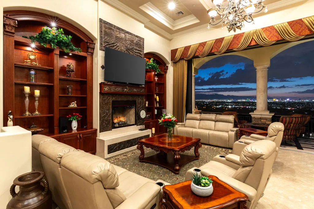 232 Valare Street Home in Henderson, Nevada. Discover the epitome of luxury living in this custom-built split-level home in Las Vegas. With stunning city views, lavish amenities, and meticulous attention to detail, this residence offers the ultimate in upscale living. From the private gated entrance to the infinity pool and spa overlooking the city, this Las Vegas dream home redefines luxury living.