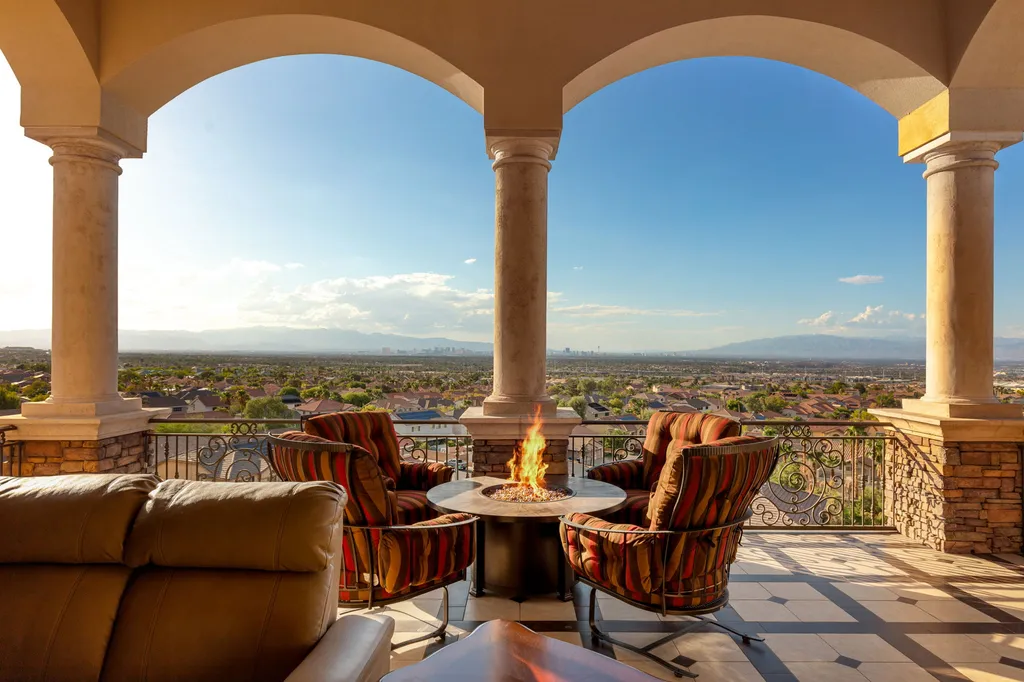 232 Valare Street Home in Henderson, Nevada. Discover the epitome of luxury living in this custom-built split-level home in Las Vegas. With stunning city views, lavish amenities, and meticulous attention to detail, this residence offers the ultimate in upscale living. From the private gated entrance to the infinity pool and spa overlooking the city, this Las Vegas dream home redefines luxury living.
