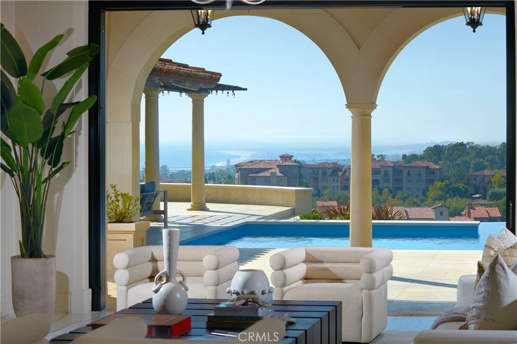 3 Del Mar Home in Newport Beach, California. Nestled behind double gates in the esteemed Estate Collection at Crystal Cove, this brand-new custom home (completed in 2023) graces one of Newport Coast's most coveted streets. Drawing inspiration from classic northern Italian villas, this grand residence offers breathtaking vistas of the Pacific Ocean, Pelican Hill Golf Course, Newport Harbor, verdant canyons, and stunning sunsets. 