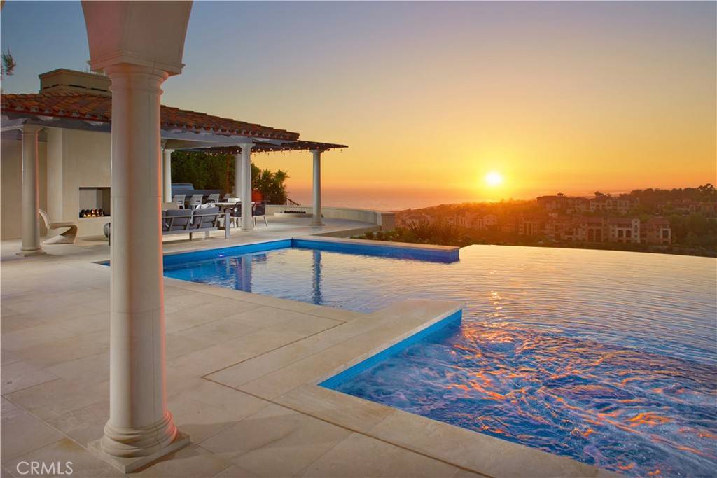 3 Del Mar Home in Newport Beach, California. Nestled behind double gates in the esteemed Estate Collection at Crystal Cove, this brand-new custom home (completed in 2023) graces one of Newport Coast's most coveted streets. Drawing inspiration from classic northern Italian villas, this grand residence offers breathtaking vistas of the Pacific Ocean, Pelican Hill Golf Course, Newport Harbor, verdant canyons, and stunning sunsets. 
