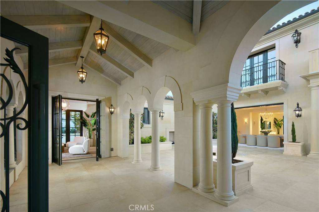3 Del Mar Home in Newport Beach, California. Nestled behind double gates in the esteemed Estate Collection at Crystal Cove, this brand-new custom home (completed in 2023) graces one of Newport Coast's most coveted streets. Drawing inspiration from classic northern Italian villas, this grand residence offers breathtaking vistas of the Pacific Ocean, Pelican Hill Golf Course, Newport Harbor, verdant canyons, and stunning sunsets. 