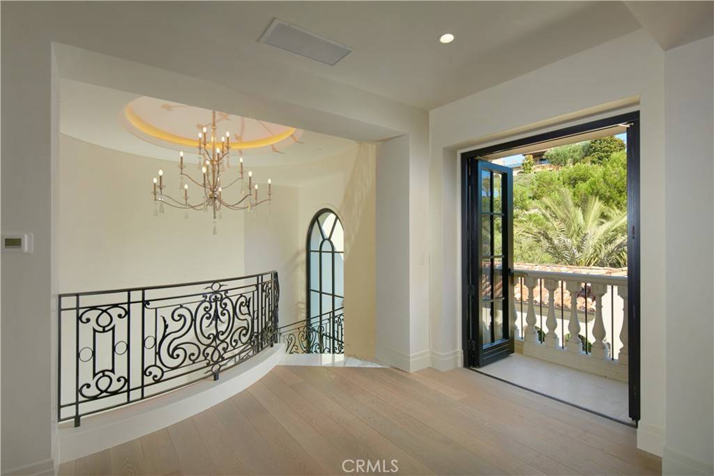 3 Del Mar Home in Newport Beach, California. Nestled behind double gates in the esteemed Estate Collection at Crystal Cove, this brand-new custom home (completed in 2023) graces one of Newport Coast's most coveted streets. Drawing inspiration from classic northern Italian villas, this grand residence offers breathtaking vistas of the Pacific Ocean, Pelican Hill Golf Course, Newport Harbor, verdant canyons, and stunning sunsets. 
