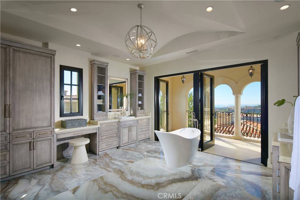 3 Del Mar Home in Newport Beach, California. Nestled behind double gates in the esteemed Estate Collection at Crystal Cove, this brand-new custom home (completed in 2023) graces one of Newport Coast's most coveted streets. Drawing inspiration from classic northern Italian villas, this grand residence offers breathtaking vistas of the Pacific Ocean, Pelican Hill Golf Course, Newport Harbor, verdant canyons, and stunning sunsets. 