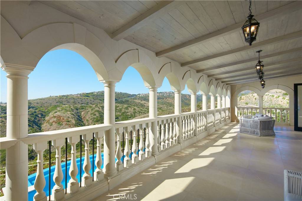 3 Del Mar Home in Newport Beach, California. Nestled behind double gates in the esteemed Estate Collection at Crystal Cove, this brand-new custom home (completed in 2023) graces one of Newport Coast's most coveted streets. Drawing inspiration from classic northern Italian villas, this grand residence offers breathtaking vistas of the Pacific Ocean, Pelican Hill Golf Course, Newport Harbor, verdant canyons, and stunning sunsets. 