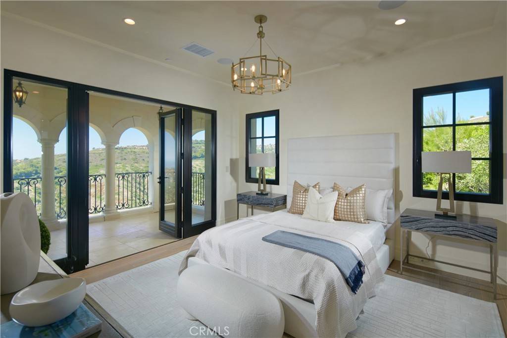 3 Del Mar Home in Newport Beach, California. Nestled behind double gates in the esteemed Estate Collection at Crystal Cove, this brand-new custom home (completed in 2023) graces one of Newport Coast's most coveted streets. Drawing inspiration from classic northern Italian villas, this grand residence offers breathtaking vistas of the Pacific Ocean, Pelican Hill Golf Course, Newport Harbor, verdant canyons, and stunning sunsets. 