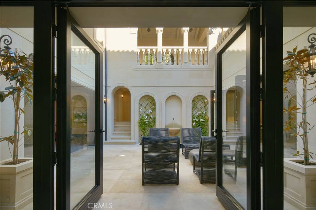 3 Del Mar Home in Newport Beach, California. Nestled behind double gates in the esteemed Estate Collection at Crystal Cove, this brand-new custom home (completed in 2023) graces one of Newport Coast's most coveted streets. Drawing inspiration from classic northern Italian villas, this grand residence offers breathtaking vistas of the Pacific Ocean, Pelican Hill Golf Course, Newport Harbor, verdant canyons, and stunning sunsets. 