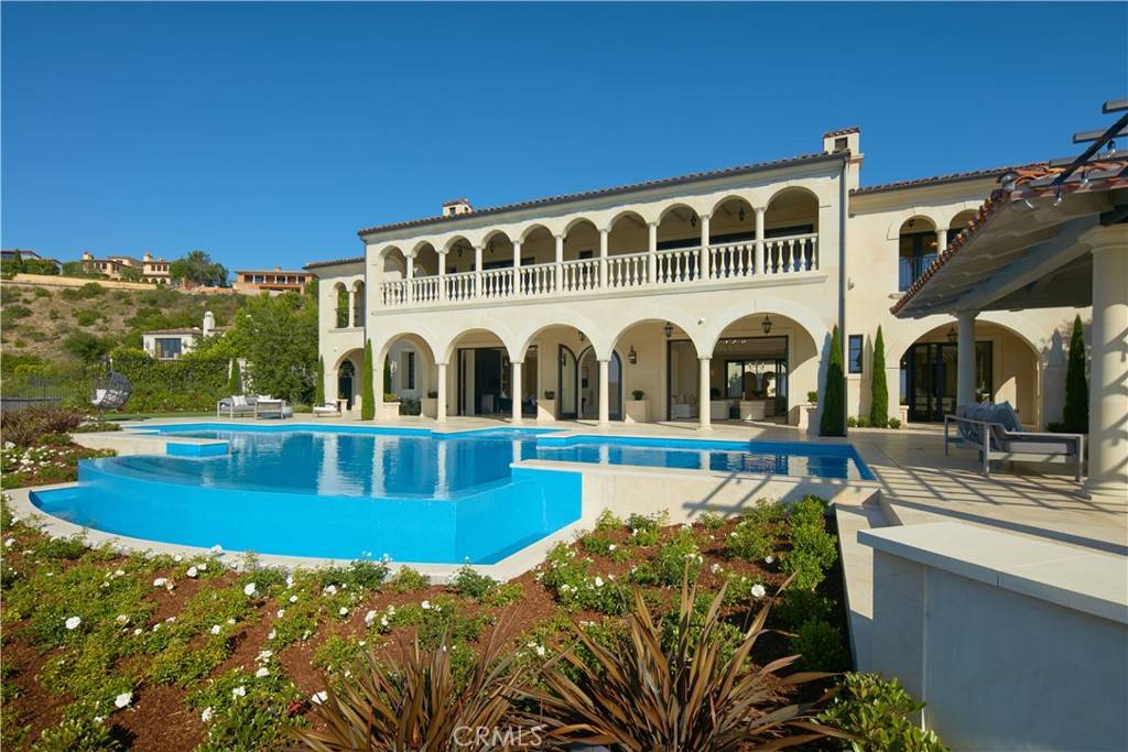 3 Del Mar Home in Newport Beach, California. Nestled behind double gates in the esteemed Estate Collection at Crystal Cove, this brand-new custom home (completed in 2023) graces one of Newport Coast's most coveted streets. Drawing inspiration from classic northern Italian villas, this grand residence offers breathtaking vistas of the Pacific Ocean, Pelican Hill Golf Course, Newport Harbor, verdant canyons, and stunning sunsets. 
