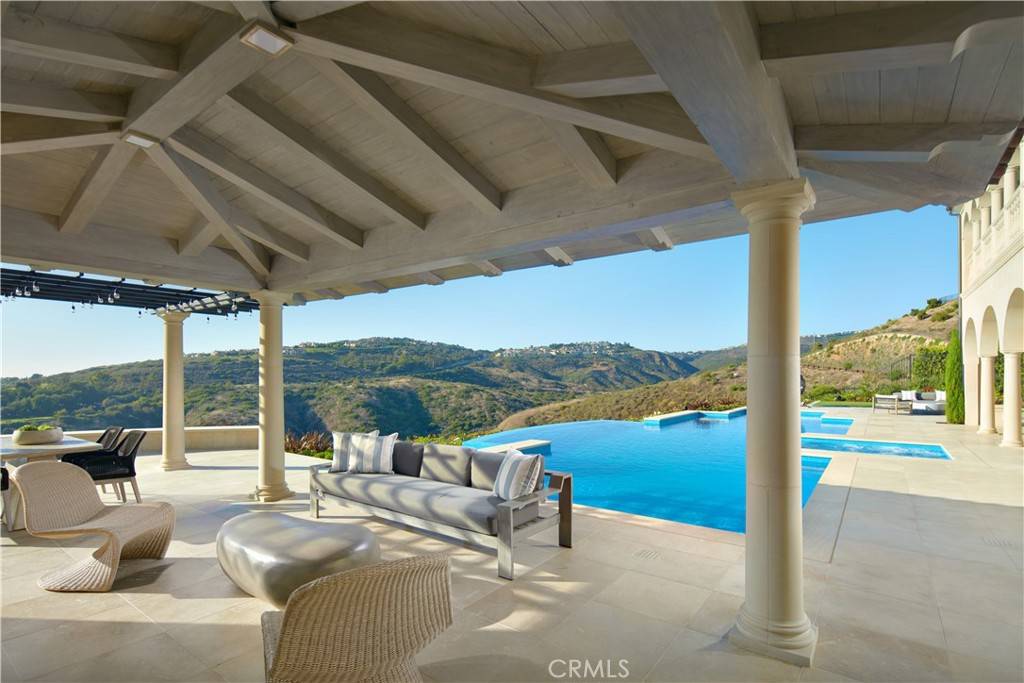 3 Del Mar Home in Newport Beach, California. Nestled behind double gates in the esteemed Estate Collection at Crystal Cove, this brand-new custom home (completed in 2023) graces one of Newport Coast's most coveted streets. Drawing inspiration from classic northern Italian villas, this grand residence offers breathtaking vistas of the Pacific Ocean, Pelican Hill Golf Course, Newport Harbor, verdant canyons, and stunning sunsets. 