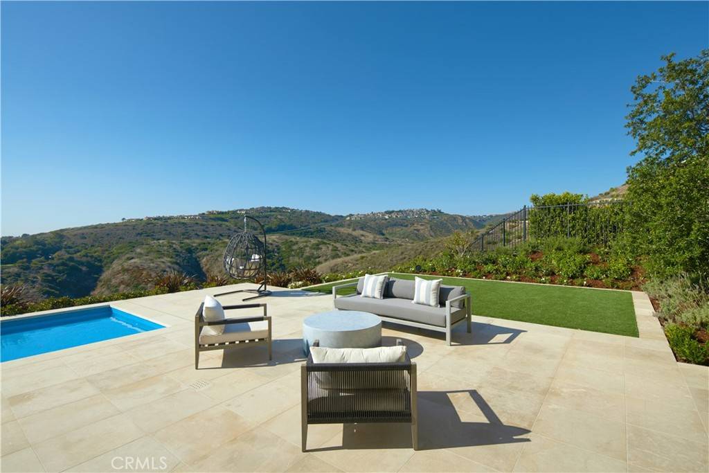 3 Del Mar Home in Newport Beach, California. Nestled behind double gates in the esteemed Estate Collection at Crystal Cove, this brand-new custom home (completed in 2023) graces one of Newport Coast's most coveted streets. Drawing inspiration from classic northern Italian villas, this grand residence offers breathtaking vistas of the Pacific Ocean, Pelican Hill Golf Course, Newport Harbor, verdant canyons, and stunning sunsets. 