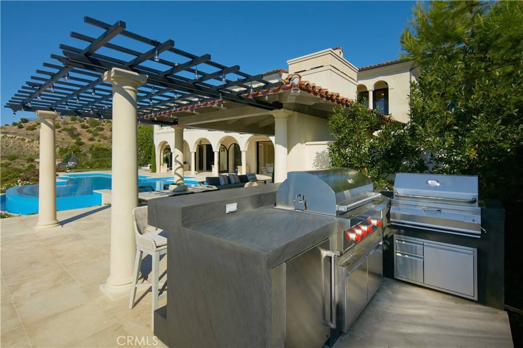 3 Del Mar Home in Newport Beach, California. Nestled behind double gates in the esteemed Estate Collection at Crystal Cove, this brand-new custom home (completed in 2023) graces one of Newport Coast's most coveted streets. Drawing inspiration from classic northern Italian villas, this grand residence offers breathtaking vistas of the Pacific Ocean, Pelican Hill Golf Course, Newport Harbor, verdant canyons, and stunning sunsets. 