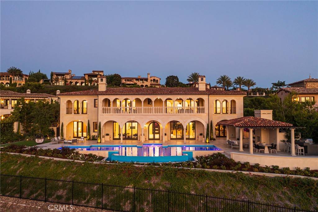 3 Del Mar Home in Newport Beach, California. Nestled behind double gates in the esteemed Estate Collection at Crystal Cove, this brand-new custom home (completed in 2023) graces one of Newport Coast's most coveted streets. Drawing inspiration from classic northern Italian villas, this grand residence offers breathtaking vistas of the Pacific Ocean, Pelican Hill Golf Course, Newport Harbor, verdant canyons, and stunning sunsets. 