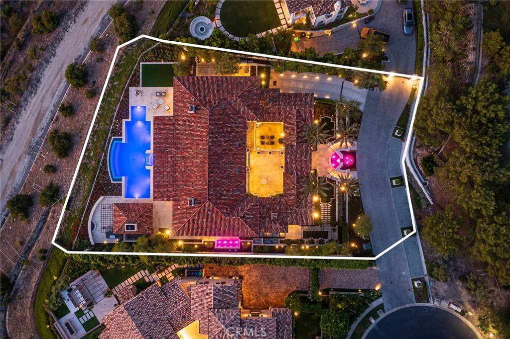 3 Del Mar Home in Newport Beach, California. Nestled behind double gates in the esteemed Estate Collection at Crystal Cove, this brand-new custom home (completed in 2023) graces one of Newport Coast's most coveted streets. Drawing inspiration from classic northern Italian villas, this grand residence offers breathtaking vistas of the Pacific Ocean, Pelican Hill Golf Course, Newport Harbor, verdant canyons, and stunning sunsets. 