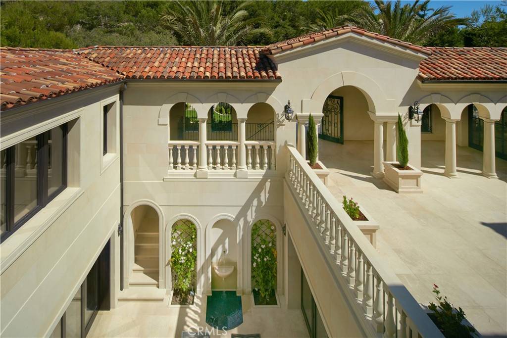 3 Del Mar Home in Newport Beach, California. Nestled behind double gates in the esteemed Estate Collection at Crystal Cove, this brand-new custom home (completed in 2023) graces one of Newport Coast's most coveted streets. Drawing inspiration from classic northern Italian villas, this grand residence offers breathtaking vistas of the Pacific Ocean, Pelican Hill Golf Course, Newport Harbor, verdant canyons, and stunning sunsets. 