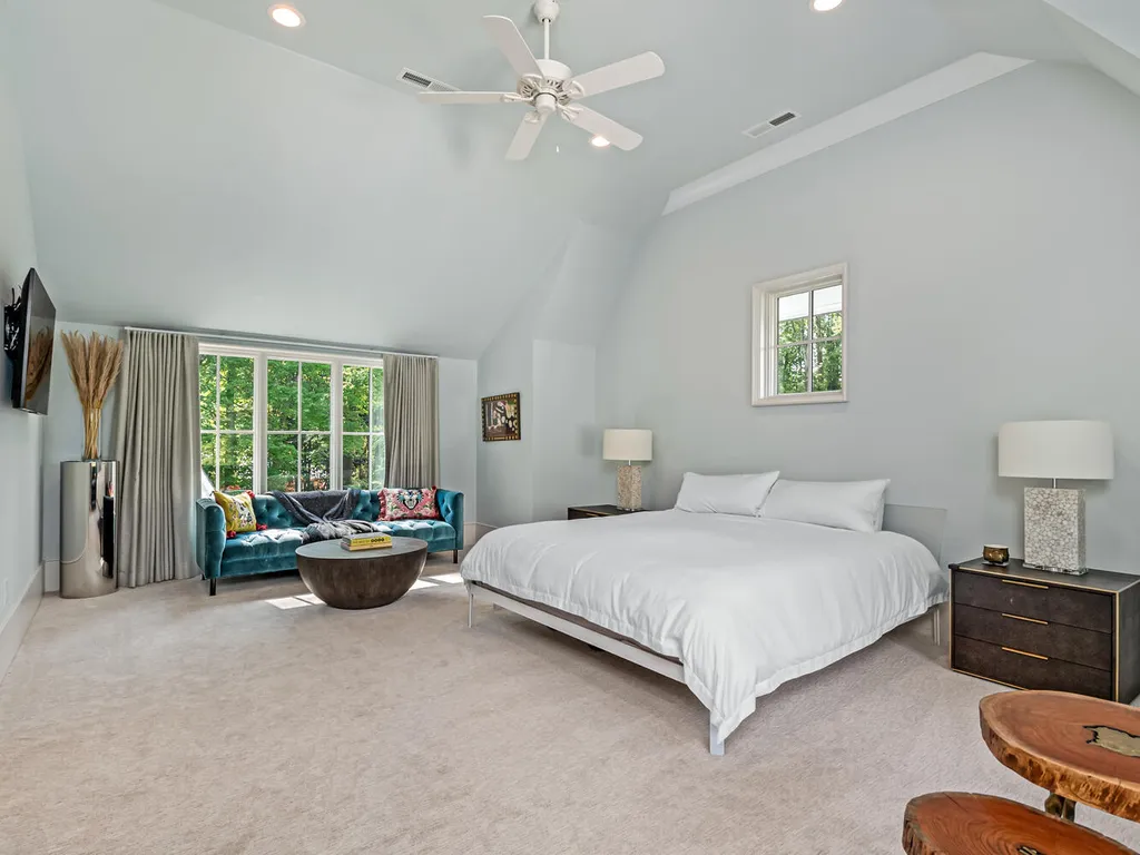 4000 Columbine Circle Home in Charlotte, North Carolina. Discover exquisite luxury living in this custom 5-bedroom, 5.5-bathroom home located in the desirable Foxcroft neighborhood. This David DuBose-designed residence features a gourmet kitchen, light-filled rooms with floor-to-ceiling windows, a spacious primary suite with a large closet, and a beautiful outdoor living space with a pool, spa, and detached garage with a flex space above.