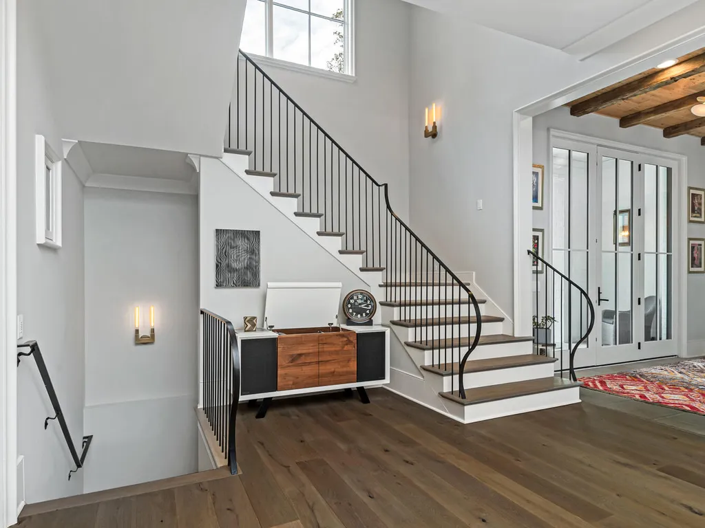 4000 Columbine Circle Home in Charlotte, North Carolina. Discover exquisite luxury living in this custom 5-bedroom, 5.5-bathroom home located in the desirable Foxcroft neighborhood. This David DuBose-designed residence features a gourmet kitchen, light-filled rooms with floor-to-ceiling windows, a spacious primary suite with a large closet, and a beautiful outdoor living space with a pool, spa, and detached garage with a flex space above.