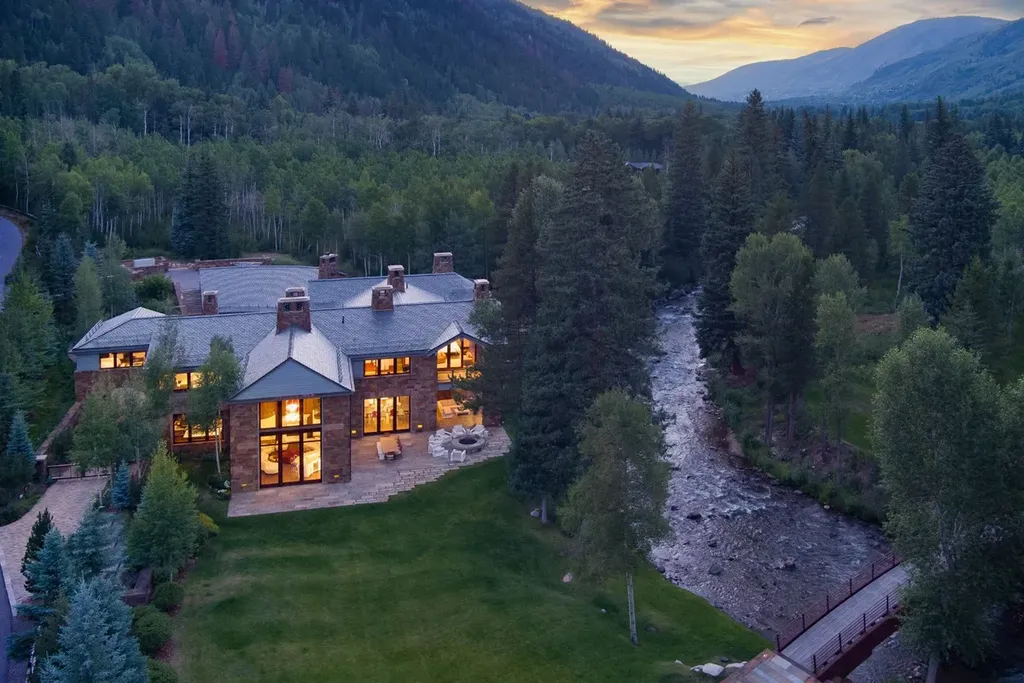 41 Popcorn Lane Home in Aspen, Colorado. Discover a truly remarkable property nestled in the heart of Aspen, where the Roaring Fork River flows just steps from your door. This unique estate, comprised of 41 Popcorn Lane and 100 Difficult Lane, offers an unbeatable combination of location, luxurious living, and stunning natural beauty.