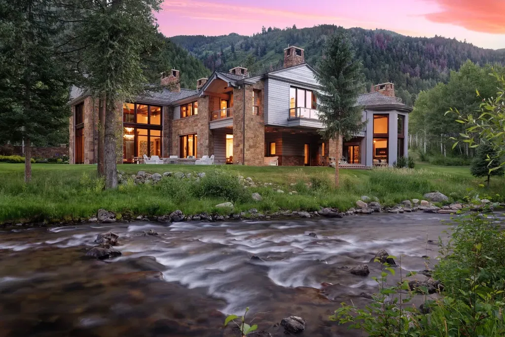 41 Popcorn Lane Home in Aspen, Colorado. Discover a truly remarkable property nestled in the heart of Aspen, where the Roaring Fork River flows just steps from your door. This unique estate, comprised of 41 Popcorn Lane and 100 Difficult Lane, offers an unbeatable combination of location, luxurious living, and stunning natural beauty.