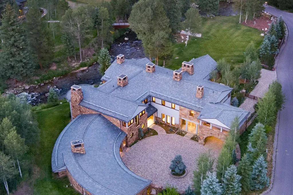 41 Popcorn Lane Home in Aspen, Colorado. Discover a truly remarkable property nestled in the heart of Aspen, where the Roaring Fork River flows just steps from your door. This unique estate, comprised of 41 Popcorn Lane and 100 Difficult Lane, offers an unbeatable combination of location, luxurious living, and stunning natural beauty.