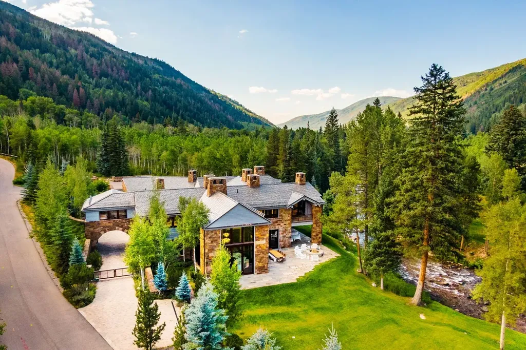 41 Popcorn Lane Home in Aspen, Colorado. Discover a truly remarkable property nestled in the heart of Aspen, where the Roaring Fork River flows just steps from your door. This unique estate, comprised of 41 Popcorn Lane and 100 Difficult Lane, offers an unbeatable combination of location, luxurious living, and stunning natural beauty.