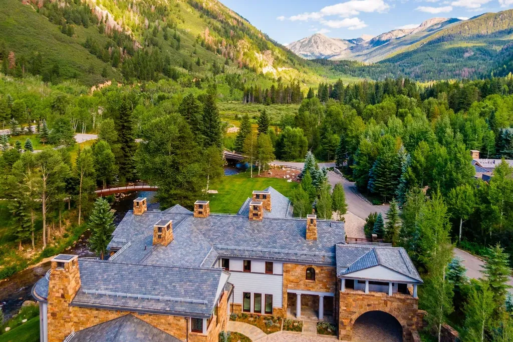 41 Popcorn Lane Home in Aspen, Colorado. Discover a truly remarkable property nestled in the heart of Aspen, where the Roaring Fork River flows just steps from your door. This unique estate, comprised of 41 Popcorn Lane and 100 Difficult Lane, offers an unbeatable combination of location, luxurious living, and stunning natural beauty.