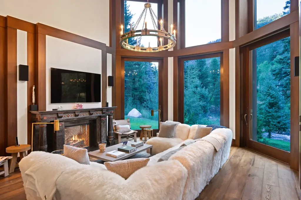 41 Popcorn Lane Home in Aspen, Colorado. Discover a truly remarkable property nestled in the heart of Aspen, where the Roaring Fork River flows just steps from your door. This unique estate, comprised of 41 Popcorn Lane and 100 Difficult Lane, offers an unbeatable combination of location, luxurious living, and stunning natural beauty.