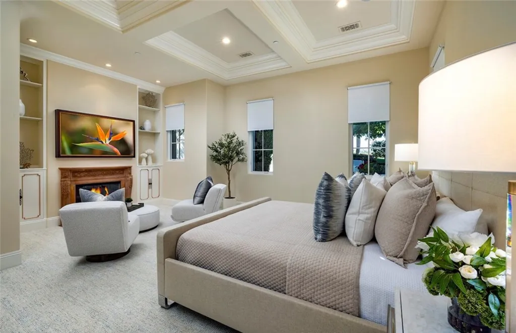 5 Pelicans Drive Home in Newport Coast, California. This stunning Pelican Crest estate is ideally located on one of the most coveted prime view lots in the community. It offers luxury and elegance along with warm and inviting living. The property has 6 bedrooms, 6.5 bathrooms, and a spacious floor plan that is perfect for both intimate living and entertaining. It also features stunning ocean views, a state-of-the-art theater, and a wine cellar.