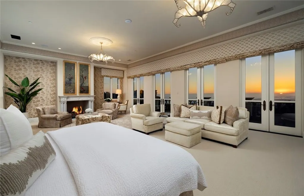5 Pelicans Drive Home in Newport Coast, California. This stunning Pelican Crest estate is ideally located on one of the most coveted prime view lots in the community. It offers luxury and elegance along with warm and inviting living. The property has 6 bedrooms, 6.5 bathrooms, and a spacious floor plan that is perfect for both intimate living and entertaining. It also features stunning ocean views, a state-of-the-art theater, and a wine cellar.
