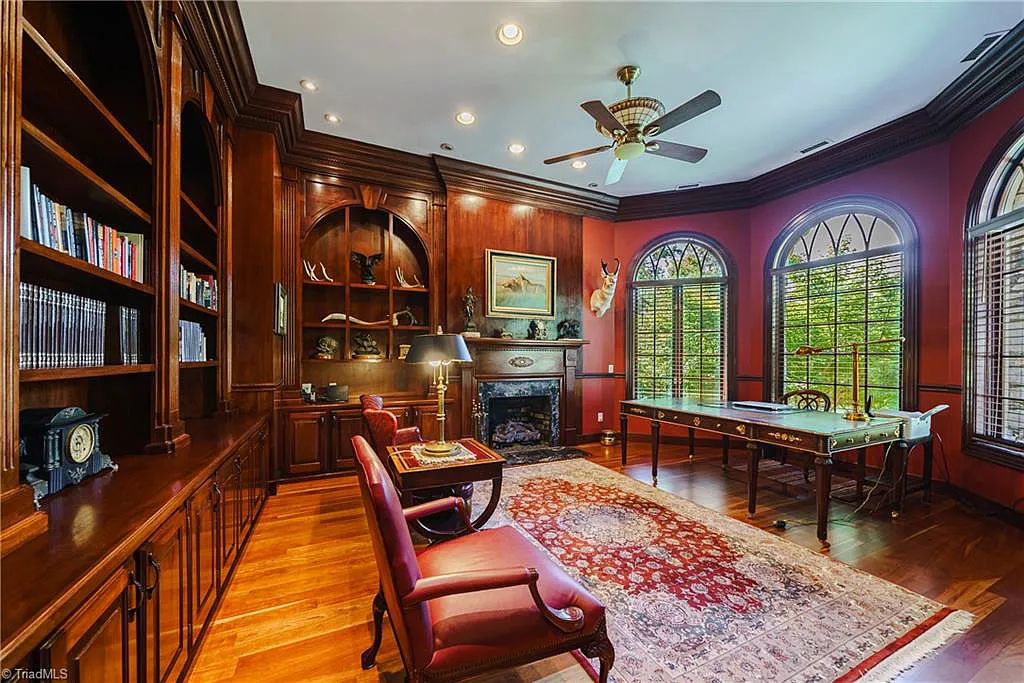 5712 Summit Road Home in Purlear, North Carolina. Explore this exceptional 128+ acre mountain retreat with a gated entrance, a timber-frame home boasting 5 bedrooms and 5 bathrooms. Enjoy the beauty of two spring-fed creeks that encircle the fieldstone exterior of the home.